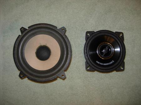 Front side of original and new speaker.